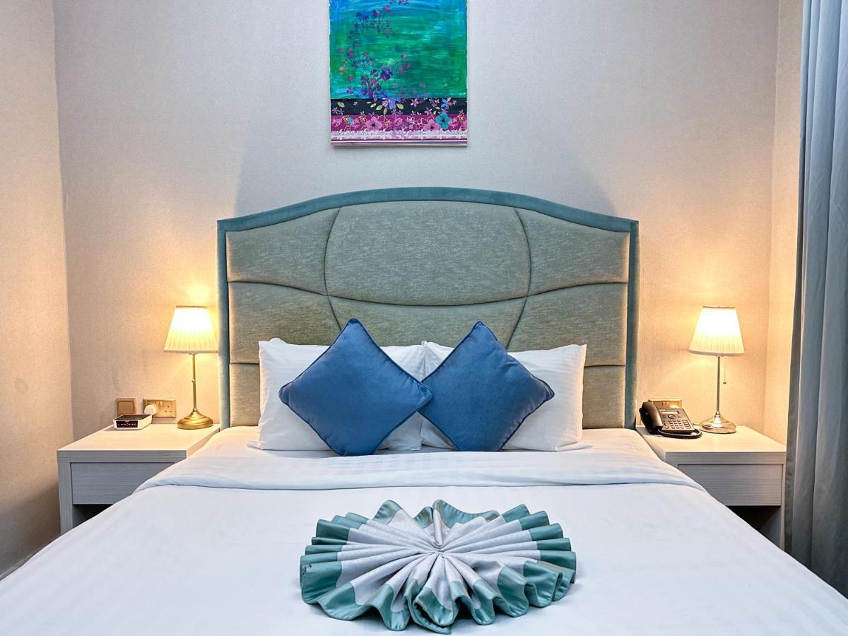 The Victory Hotel Doha Bagian luar foto