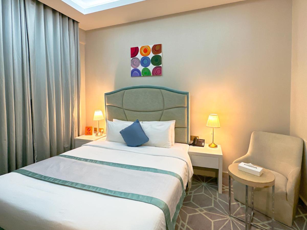 The Victory Hotel Doha Bagian luar foto